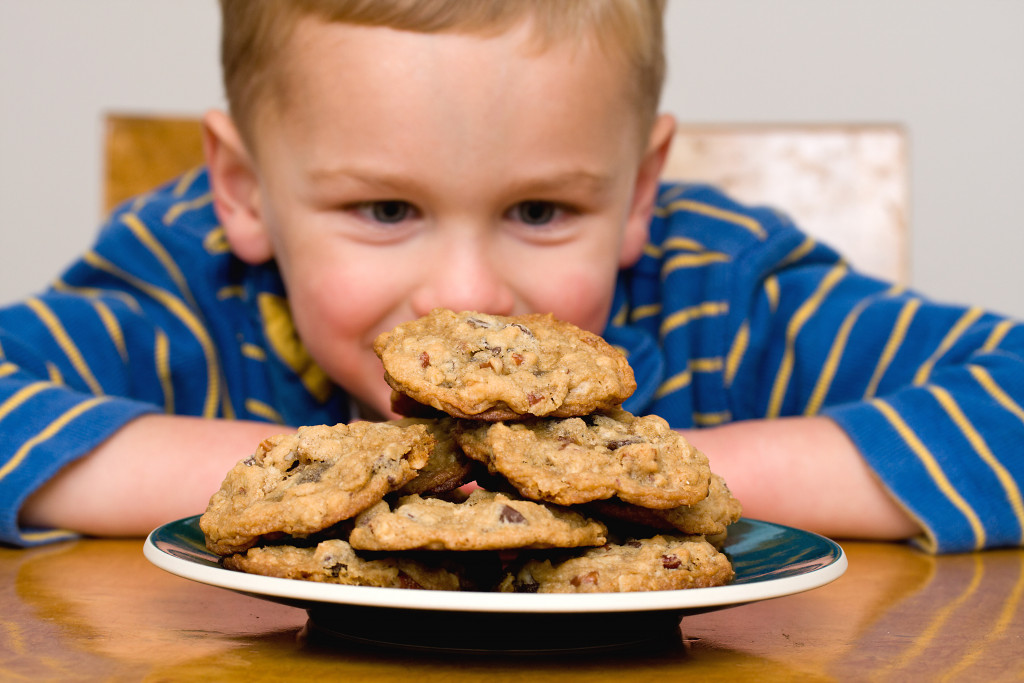 kid looking at cookies